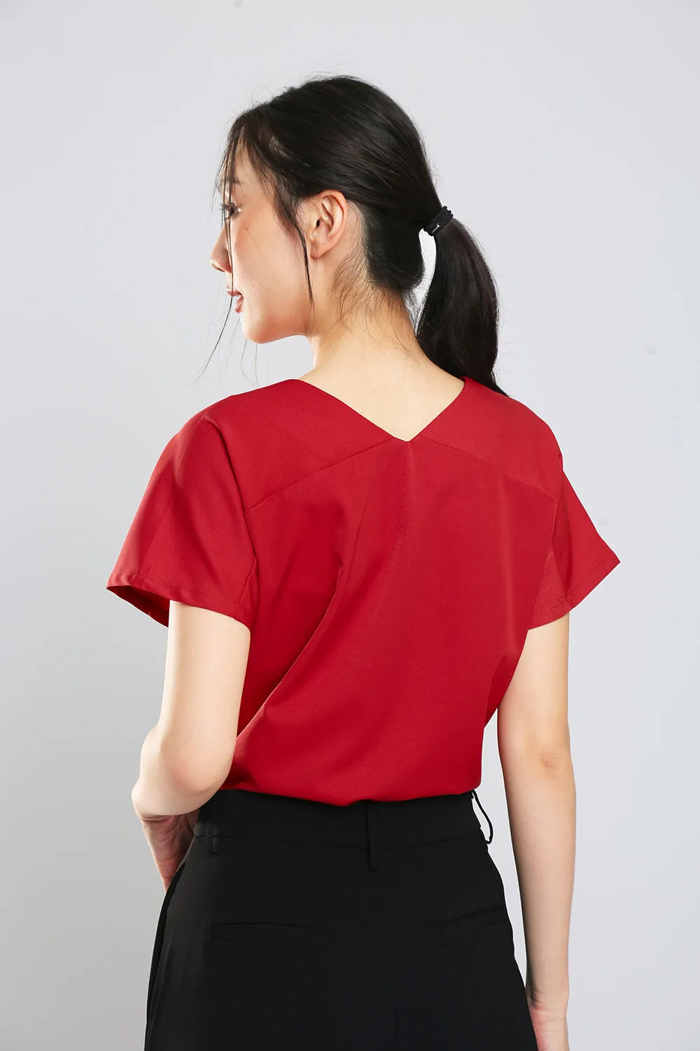 Danna V-Neck Top in Brick Red