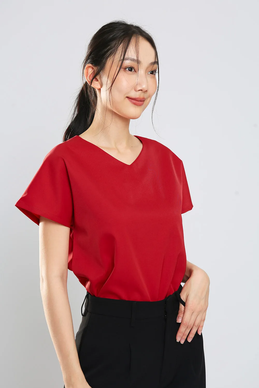 Danna V-Neck Top in Brick Red