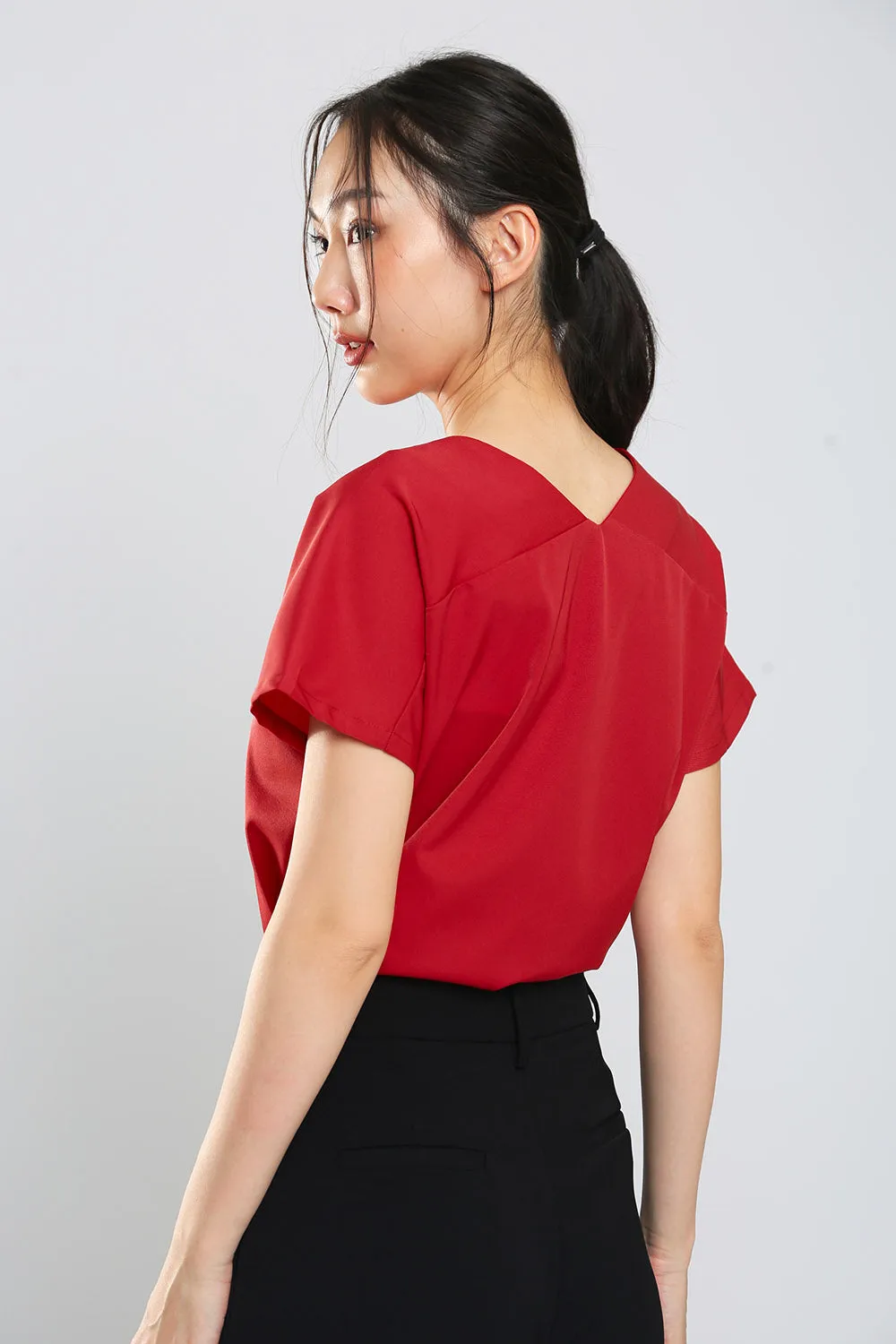Danna V-Neck Top in Brick Red