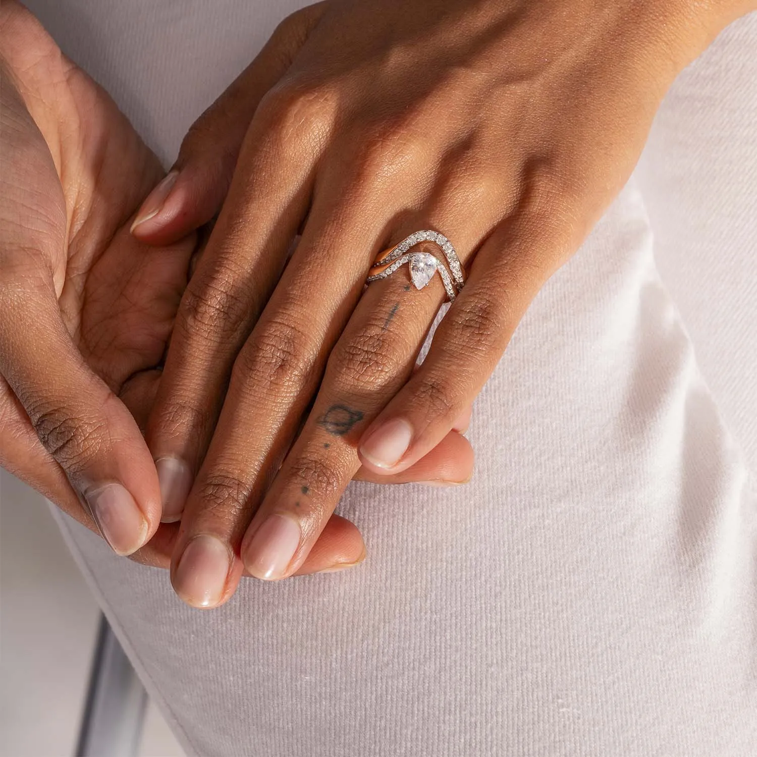 Halo Ring | Half pavé, rose gold & pear diamond