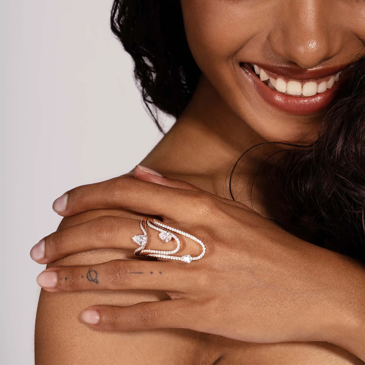 Halo Ring | Half pavé, rose gold & pear diamond