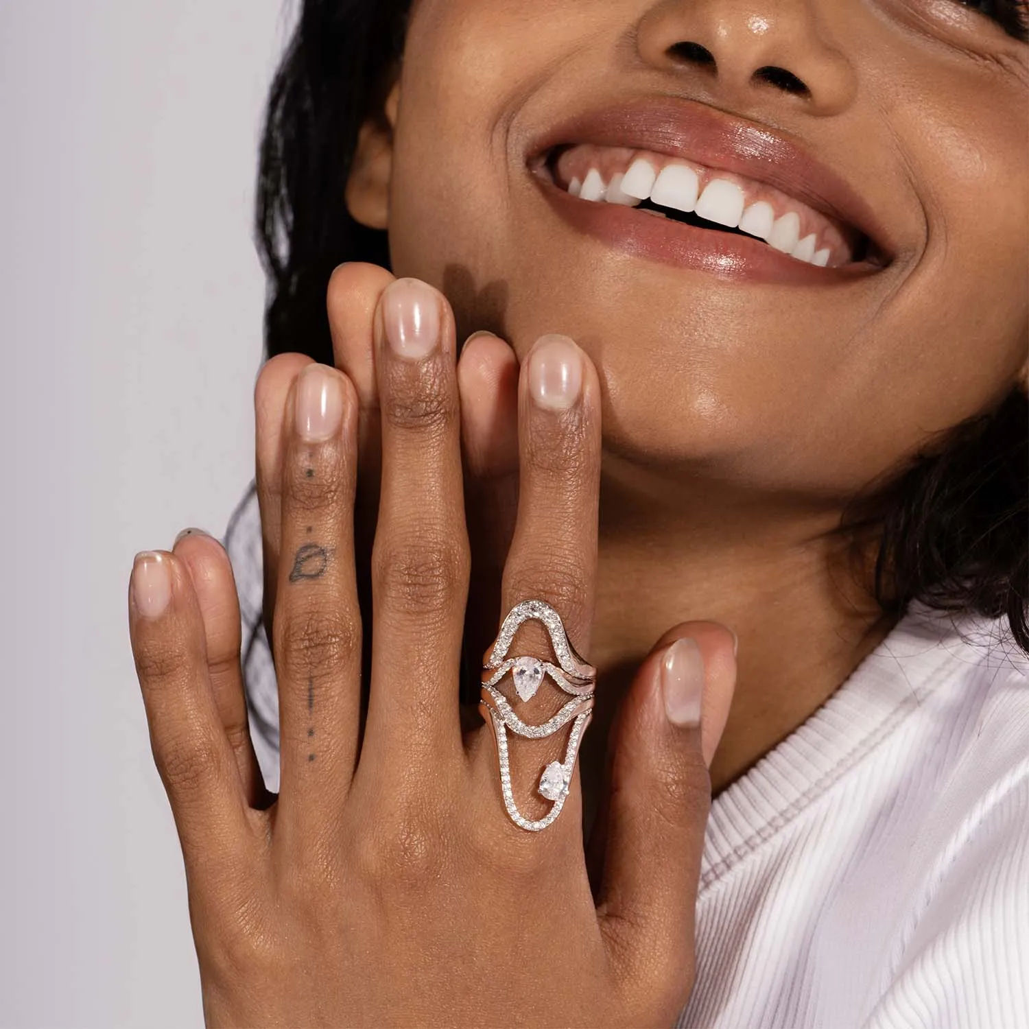 Halo Ring | Half pavé, rose gold & pear diamond